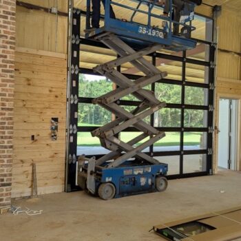 technicians working on a door repair