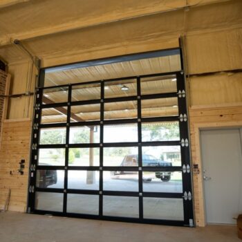 commercial door and a car in front of it