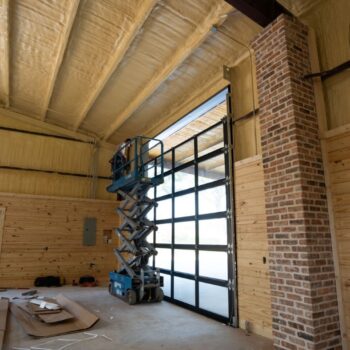 a tehnician working on a commercial door